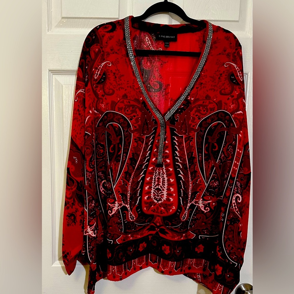 Festive plus size Lane Bryant blouse. Semi sheer, bling v-neck. Worn once. 22/24